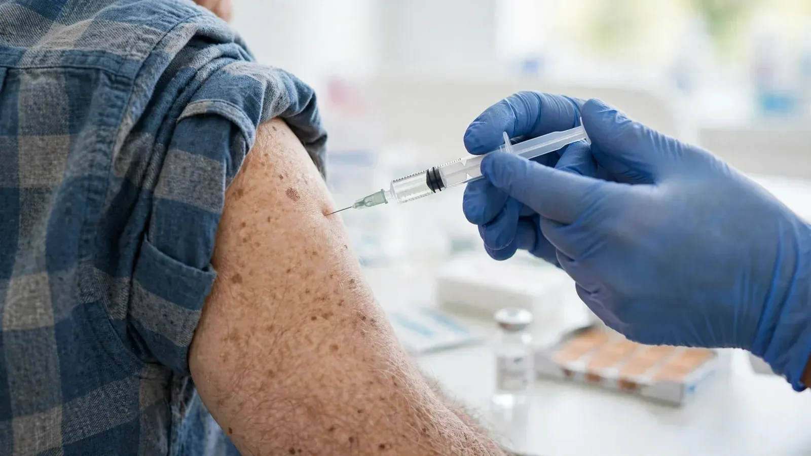 Close-up of a senior patient receiving a fall vaccination